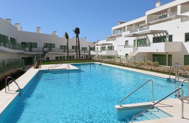 Modern Apartment with Wifi in Frontline Complex with Pool, & private parking