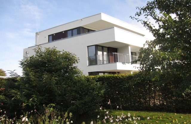 Appartement moderne avec une vue imprenable sur l'eau et le pont de Rügen