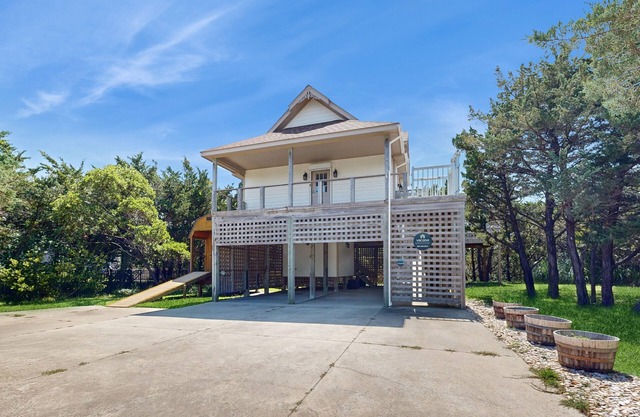 Modern Avon retreat with beach access, community pool, and stunning water views