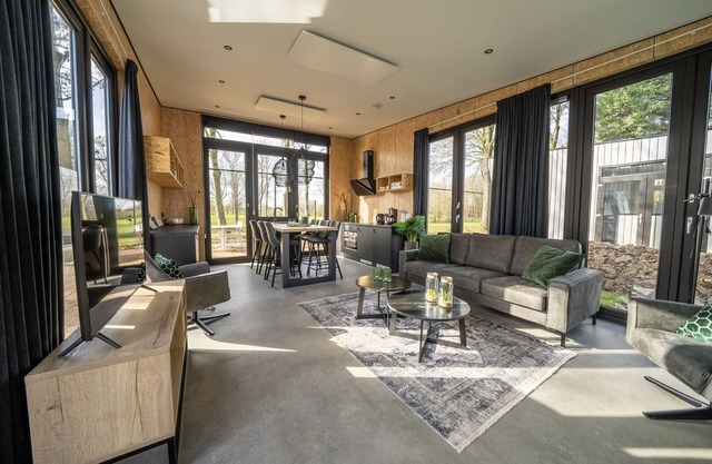 Chalet moderne au bord de la Meuse