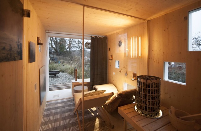 Appartement au design moderne avec vue sur le lac et jardin sauna
