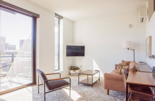 Modern East Side 1BR Apt with Balcony, Pool, and Gym
