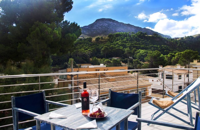 Appartement moderne avec terrasse ensoleillée et vue sur les montagnes