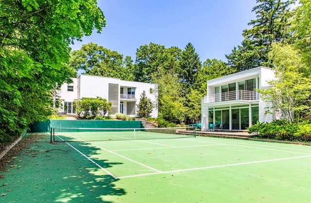 Modern getaway with private beach, tennis court, free WiFi, & more