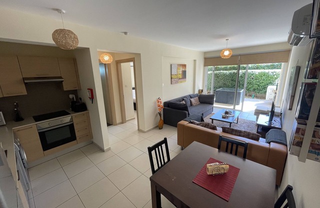 Modern ground floor apartment with patio, pool and tennis court