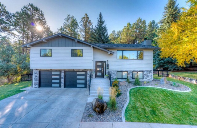 Modern home with privacy of the hills right in town!