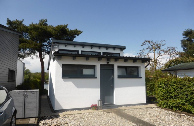 maison moderne avec accès direct au lac