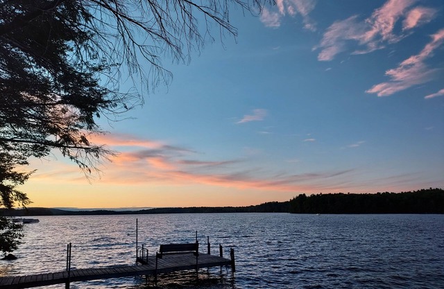 Modern lakeside log cabin on pristine East Pond Oakland Maine's Belgrade Lakes