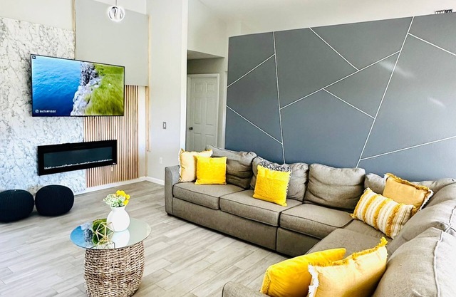 Modern luxury Beach house w/ free heated pool seating in half acre lot and canal
