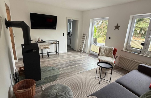 Modern renovated vacation home with terrace, garden view and oven in Bankendorf -