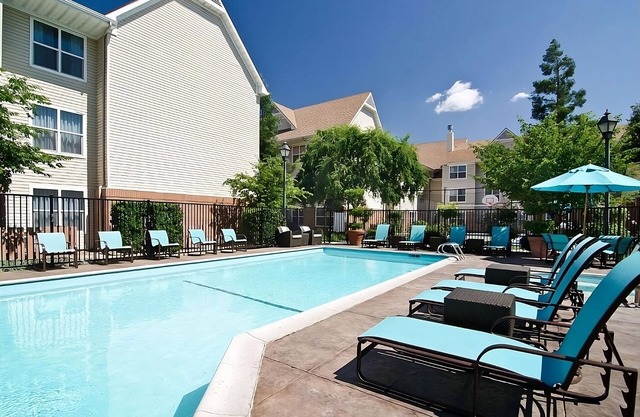 Modern Retreat in Central Fresno! Outdoor Pool, Pets Allowed, Full Kitchen!