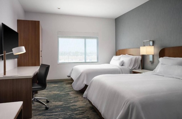 Modern Suites and Family Fun: Steps from Disney and Free Breakfast
