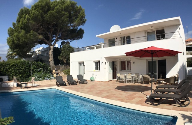 Modern villa a few minutes walk from Punta Prima Beach.