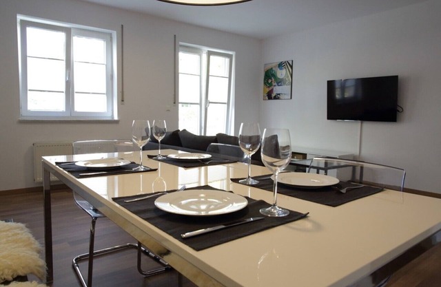 Appartement moderne de 60 m² avec terrasse et balcon, proche du centre