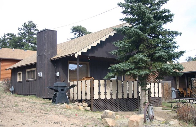 Mountain Decor in this Two Bedroom Cabin with a beautiful mountain view from deck. Dog friendly