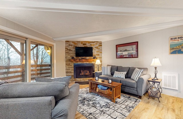 Mountain-view condo with large covered balcony, fireplace, & washer/dryer