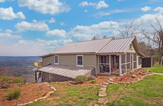 Mountain view home with a hot tub, washer/dryer, central AC, deck