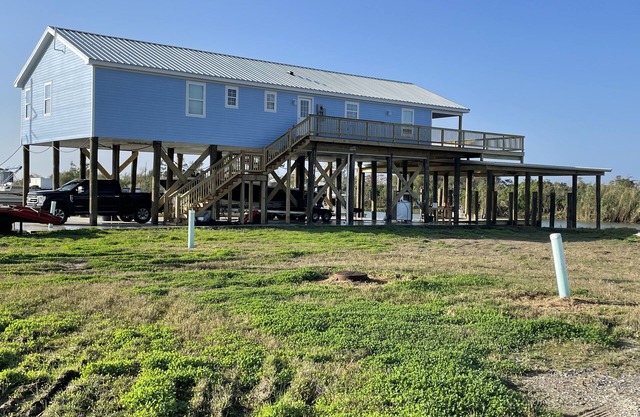New 3 bedroom 3 full bath house with a boat slip