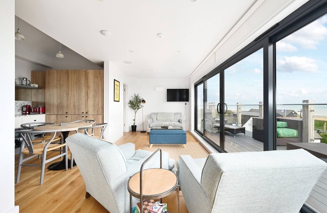 New apartment nestled on the seaside with expansive views of cliffs, sea and sky