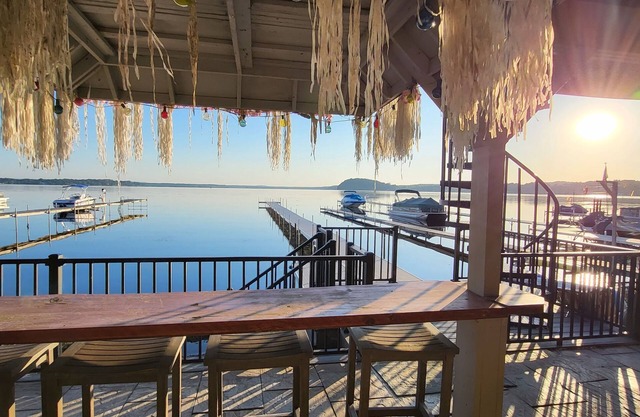 New - First floor lakefront condo, dock access, walk to marina & restaurants!