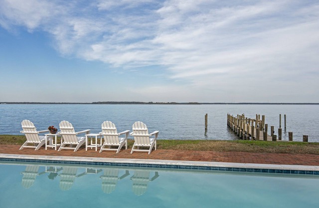 NEW! Gorgeous Waterfront Estate with Saltwater pool, beach and dock