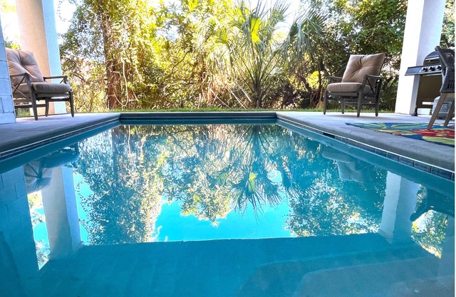 New Home! Free Heated Pool, Short Stroll to Beach