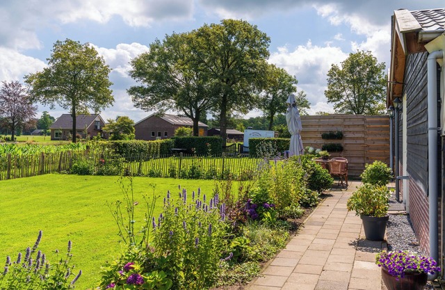 maison neuve avec grand jardin et jardin d'hiver