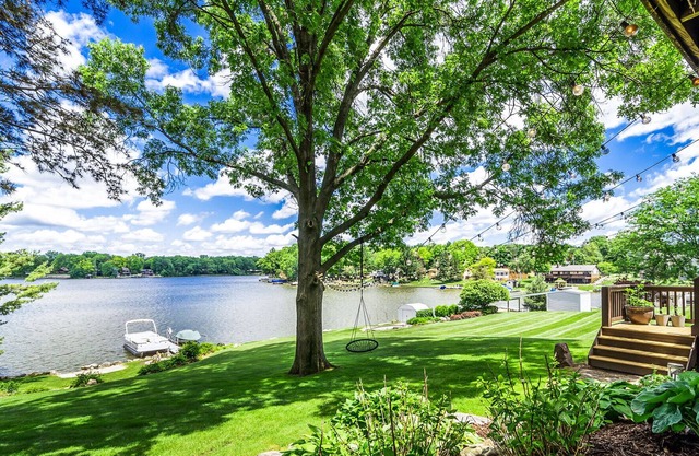 New- listing! 6 BR wooded lakefront home.