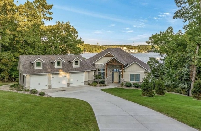 NEW LISTING Luxurious Lakefront Home in Prestigious Porta Cima Neighborhood