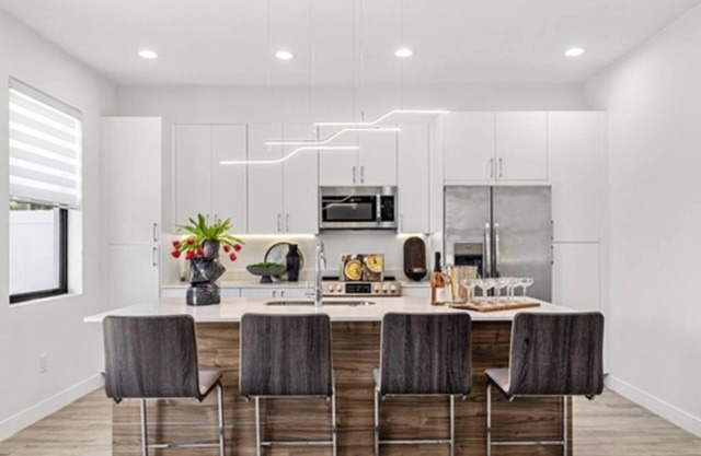 4 Co-Located Central Tampa Townhomes, Fully Loaded