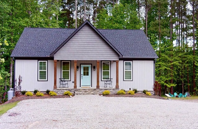 New property at Kerr Lake with dock! Family-sized w/ game room and large porch!