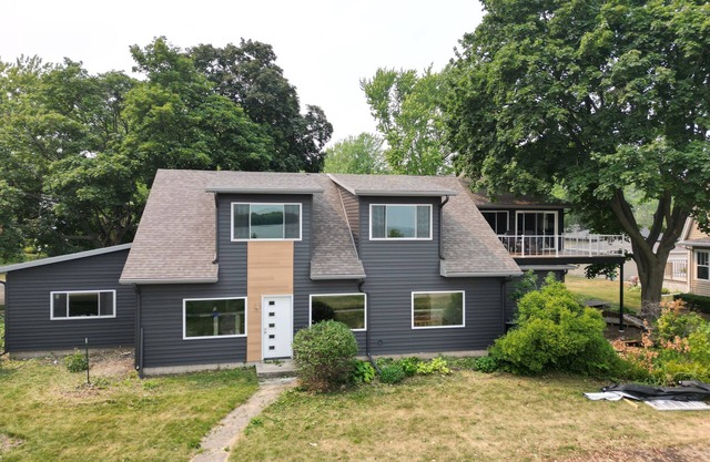 New Renovation! Gorgeous Lake Views! Outdoor Hot Tub, Huge open concept rooms!