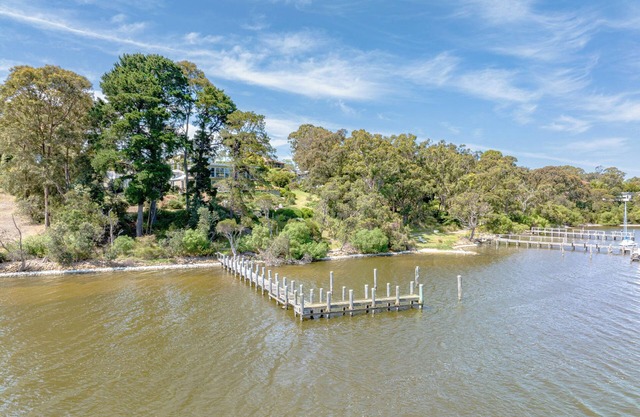 This spacious waterfront property with your own private deep water jetty