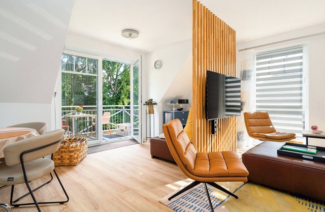 Newly built apartment (80sqm) with balcony directly on the water near Greetsiel!