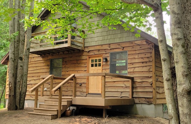 Newly remodeled Beautiful Betsie riverfront home 500'waterfront Ski fish explore