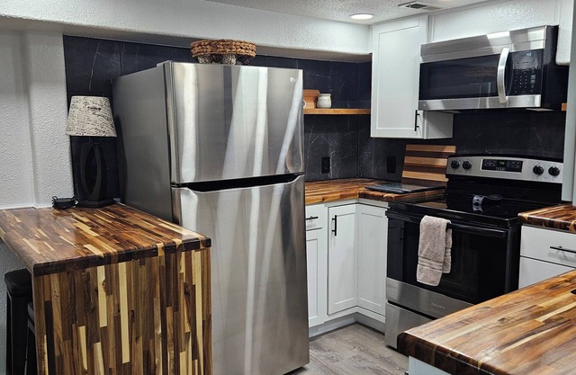 Newly renovated 1934 6-bedroom, 3 bath, 2 full kitchen, kitchenette & 2 laundry