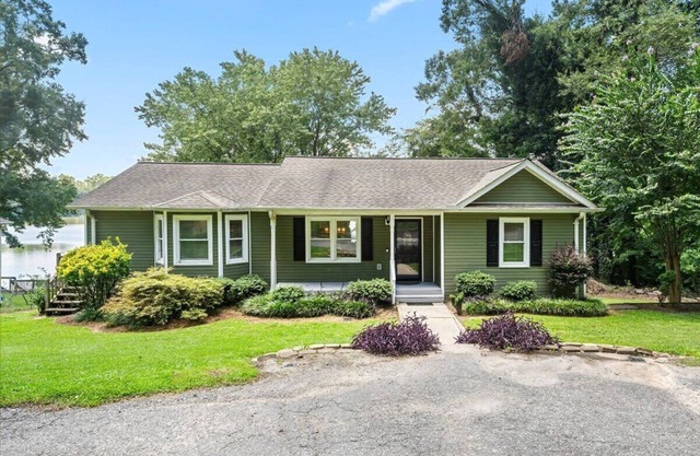 nExperience Serenity on Broadway Lake in this beautiful 3 bedroom home