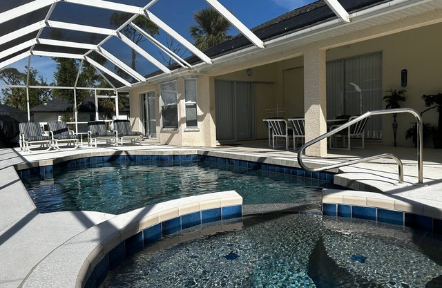 Family villa with great amenities, a luxurious pool, and stunning beaches!