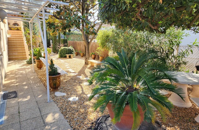 Agréable et lumineux appartement de 75m² avec jardin arboré cloturé