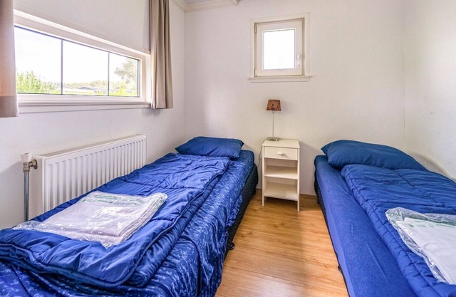 Agréable appartement dans une maison de vacances pour 4 personnes avec WIFI, piscine, TV et parking