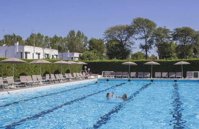 Agréable appartement pour 4 personnes avec piscine, WIFI, climatisation, TV et parking