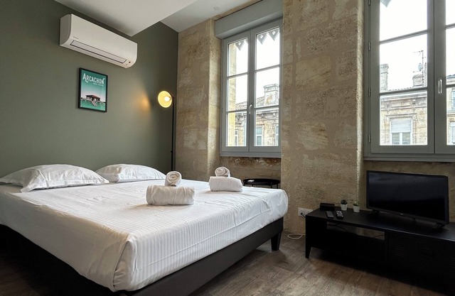 Bel appartement lumineux avec climatisation et pierre Bordelaise pour 2p