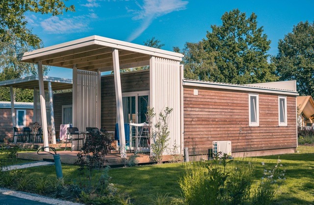 Chalet compacto con airco, cerca de Efteling