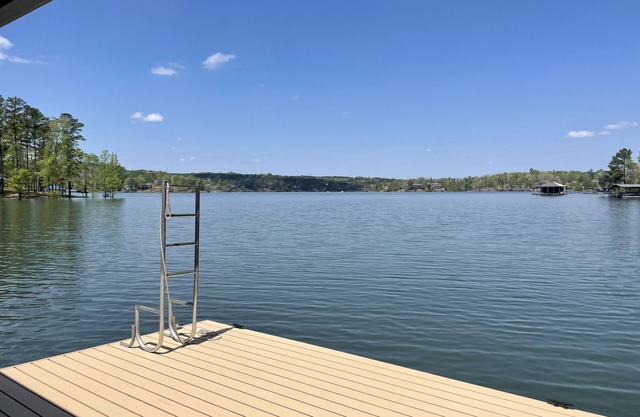 At the waters edge! No steps, Game Room, Canoe & Kayaks, Dock, All Paved Roads!