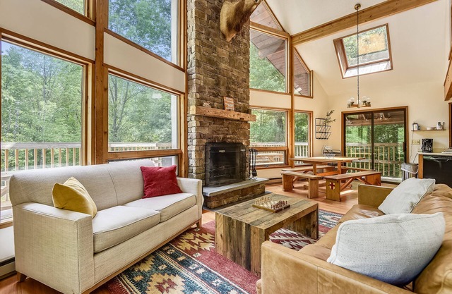 Northeast Passage Chalet is a cozy and warm. Wonderful hot tub on the deck and a great big stone fireplace.