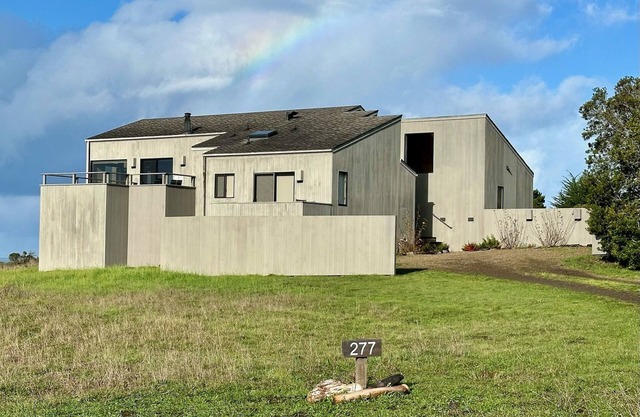 Ocean meadow home, great views, hot tub, EV charger, shared pools