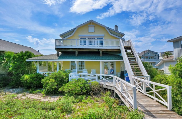Oceanfront beach cottage on the South end of Wrightsville Beach. Sleeps 14.