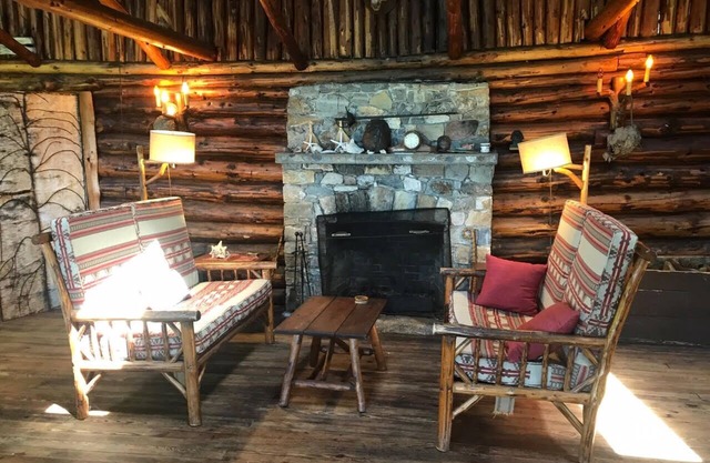 Log Cabin on Southport Isl,10 acres, 400' waterfrt, deepwater dock, sunset views