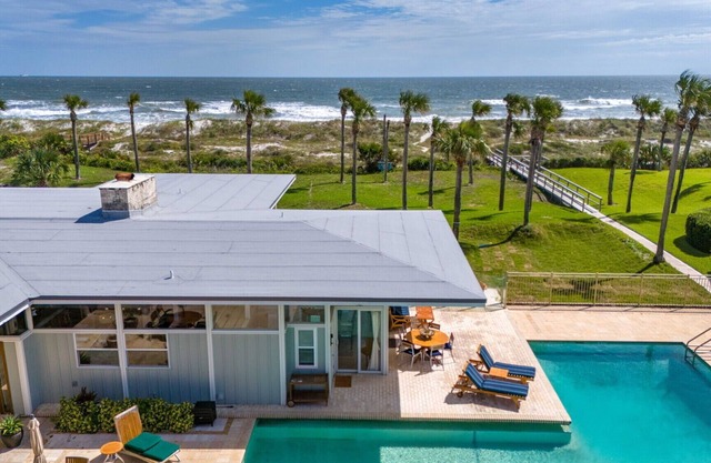 Oceanfront unit in the mid-century modern 1.7 acre Atlantic Beach Estate