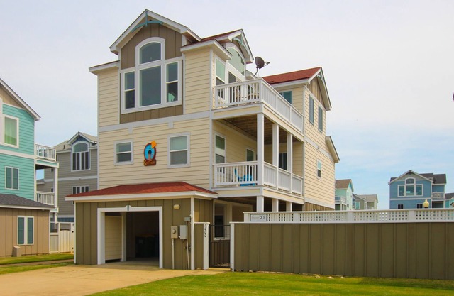 Oceanside home with private hot tub, central AC, fireplace, and pool access